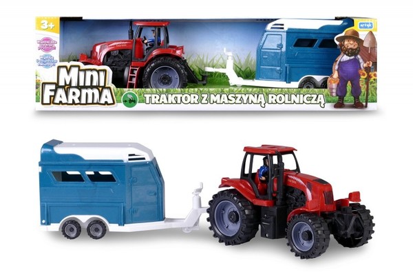 Traktor z maszyną rolniczą mówiący po polsku